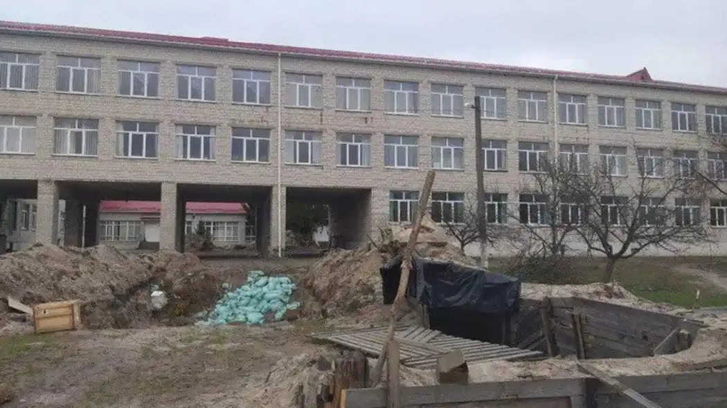 Russian war crimes in Katiuzhanka  torture chamber and toilets in classrooms - en